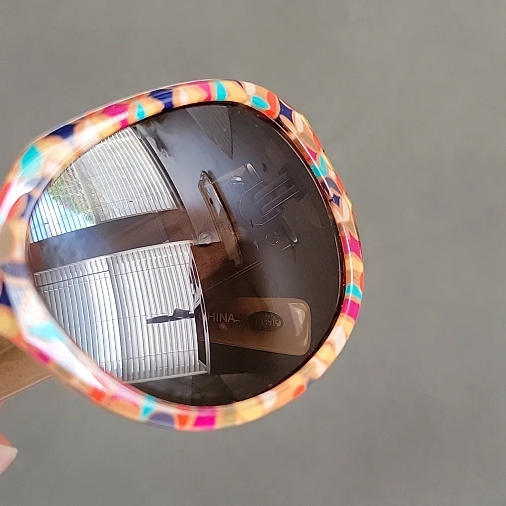 Fossil Sunglasses feature a distinctive multicolor geometric mosaic